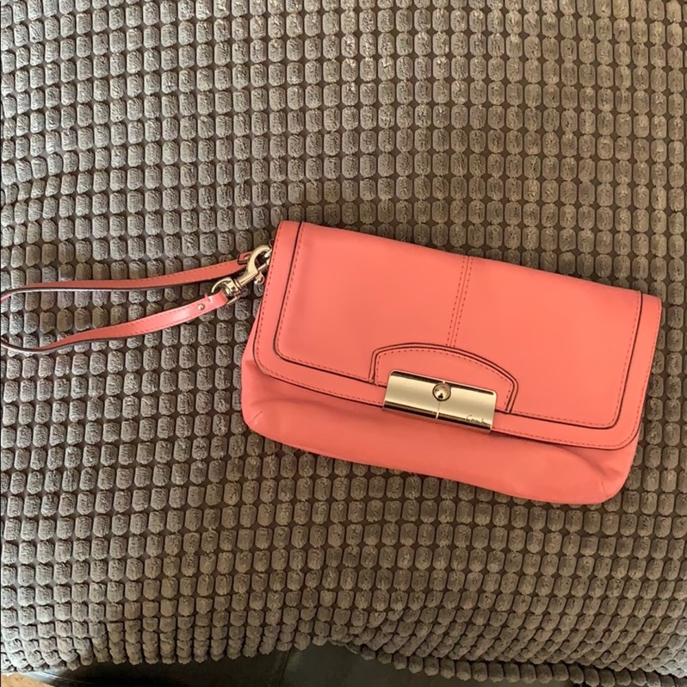 Pink leather coach wristlet